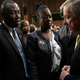 Lawyer Benjamin Crump and Sybrina Fulton, mother of Trayvon Martin, greet Sen. Richard Durbin during a Senate Judiciary Committee hearing on 'Stand your ground' laws Oct. 29, 2013, in Washington, D.C.
Win McNamee/Getty Images